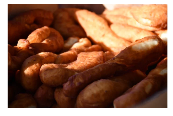 Eating firi firi is a great way to start your day in Tahiti